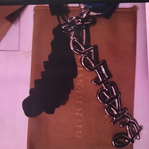 BURBERRY KEYCHAIN DOODLE TEXT METAL NWT AUTHENTIC RARE PURSE CHARM - Picture 6 of 10